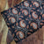 Black and Orange Bagru Hand Block Printed Cotton Fabric with paisley print
