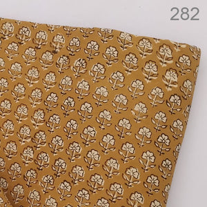 Yellow and Off white Dabu Hand Block Printed Pure Cotton Fabric with floral print