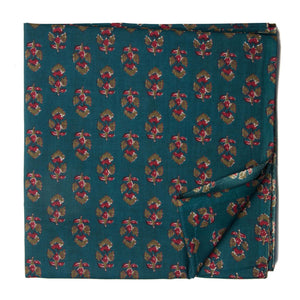 Blue and green screen printed cotton fabric with man with floral design