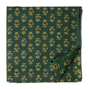 Green screen printed cotton fabric with man with floral design