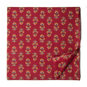 Red and yellow screen printed cotton fabric with man with floral design