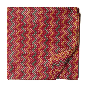 Red and yellow screen printed cotton fabric with zigzag design