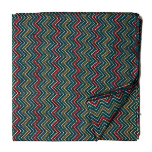 Blue and green screen printed cotton fabric with zigzag design