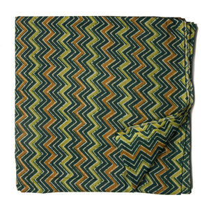 Green and yellow screen printed cotton fabric with zigzag design