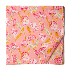 Peach screen printed pure cotton fabric with floral design